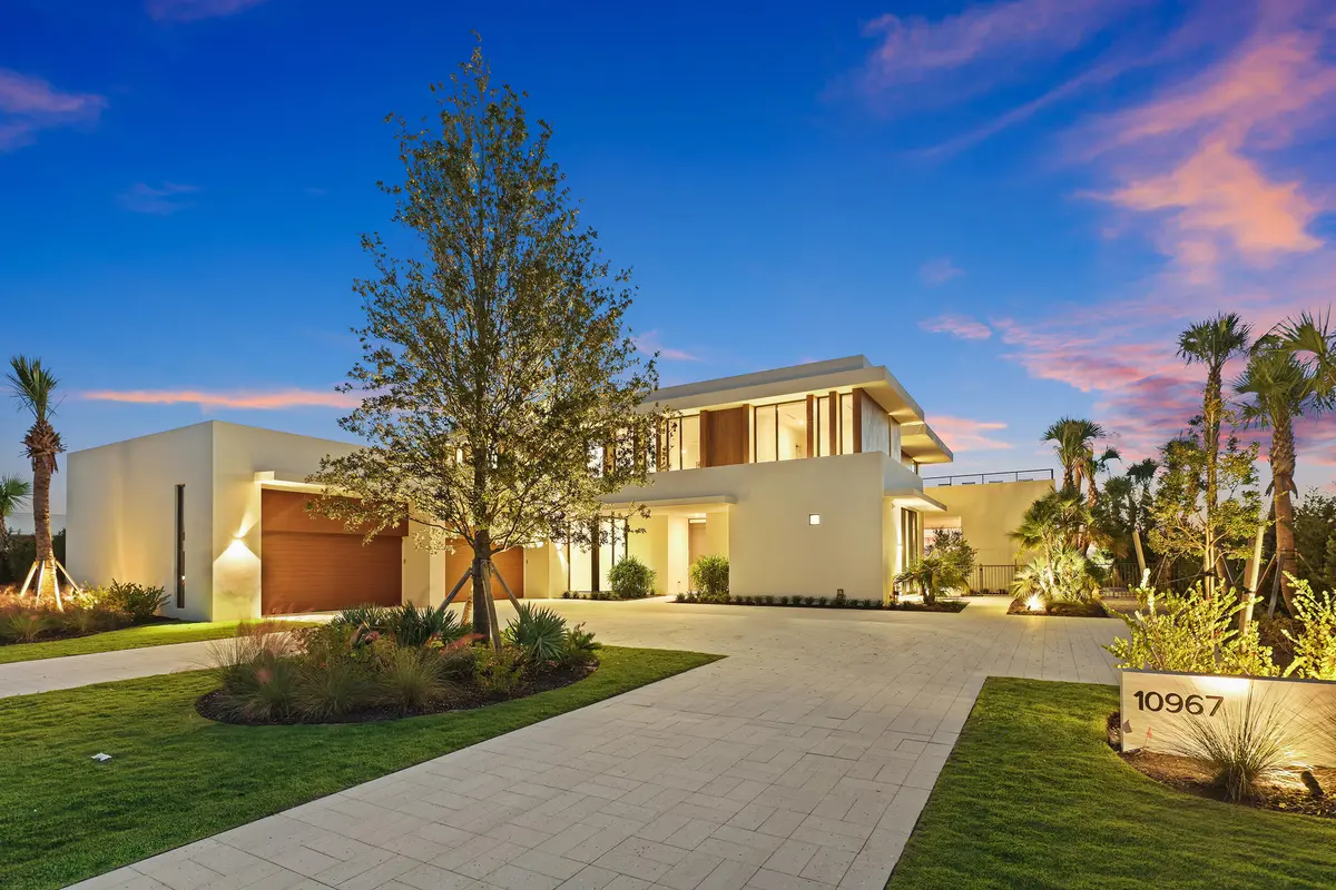 Twilight Exterior Front at 10967 Monte Rosa Drive, Palm Beach Gardens