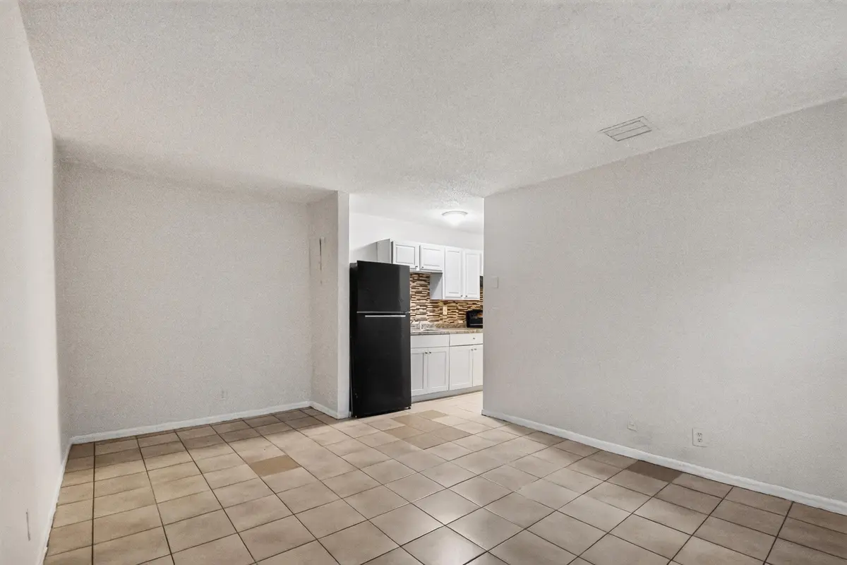 Unit 2 - Dining area and kitchen at 633 10th Street 2, West Palm Beach