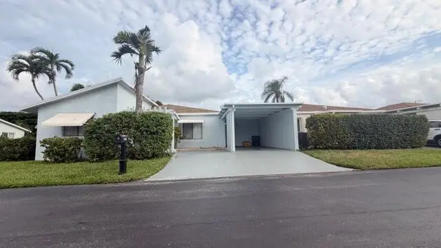 Front at 14880 WILDFLOWER Lane, Delray Beach
