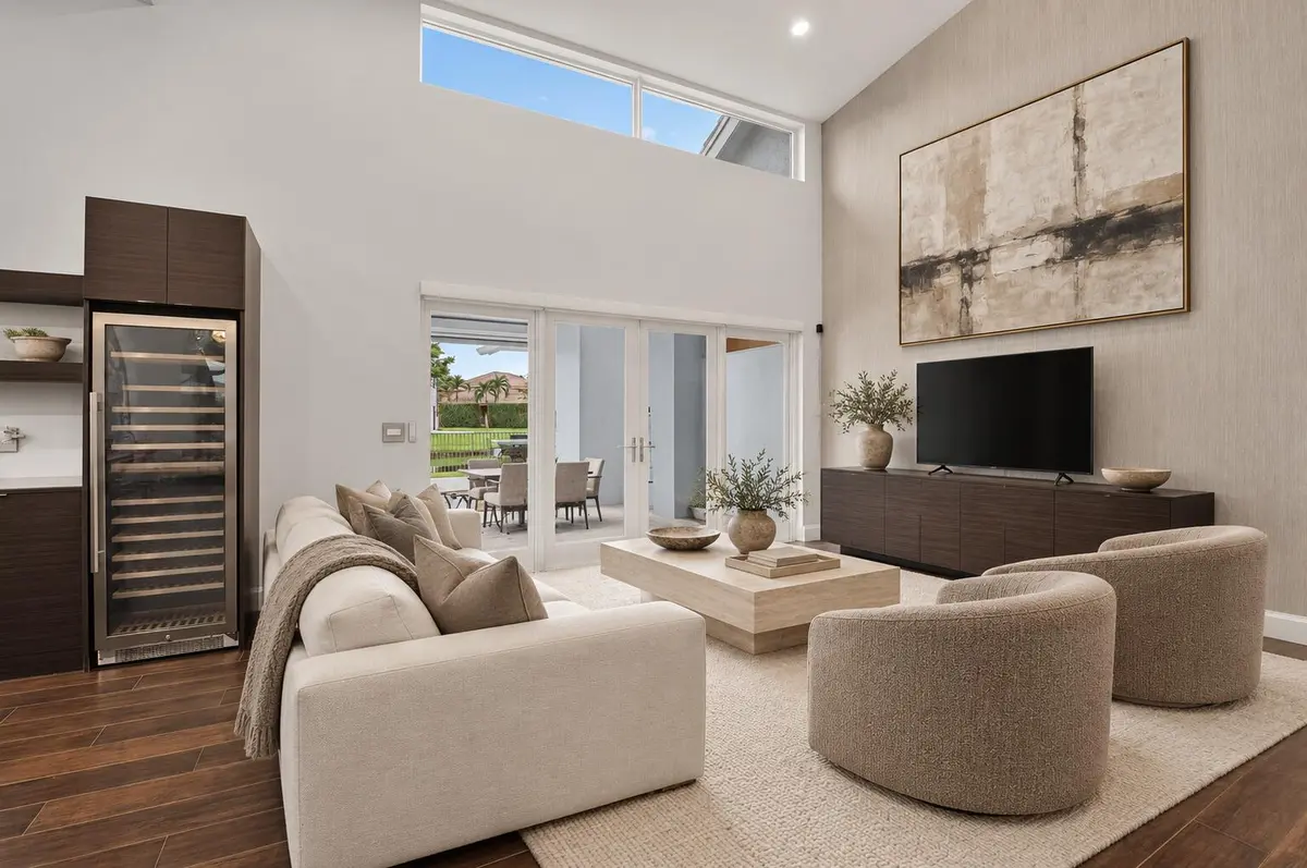 Sophisticated ivory and taupe living roo at 5757 HARRINGTON Way, Boca Raton