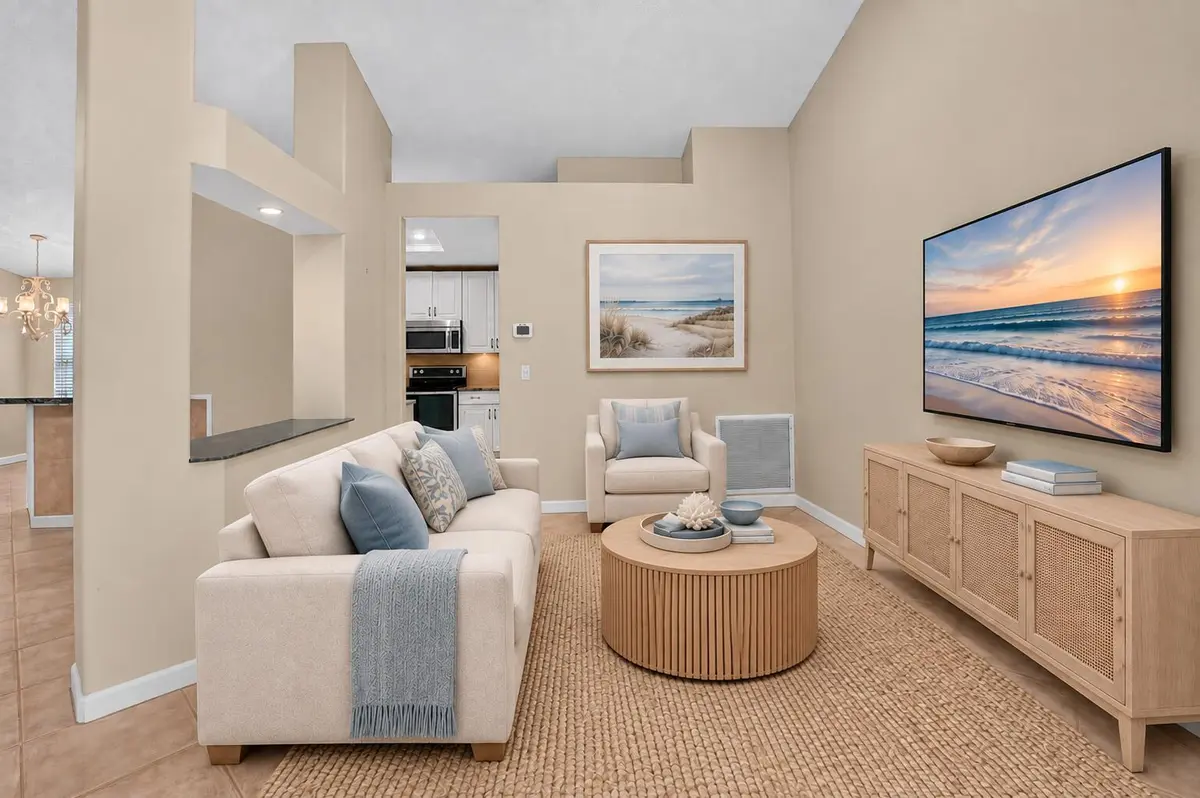 Coastal Living Room with Sunset TV next at 7423 BRUNSWICK Circle, Boynton Beach
