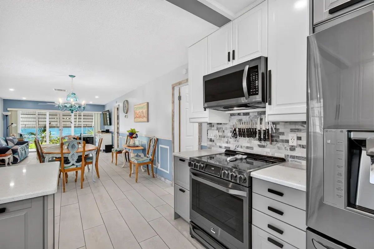 05_kitchen_to_living at 812 Meadowlark Lane, Delray Beach