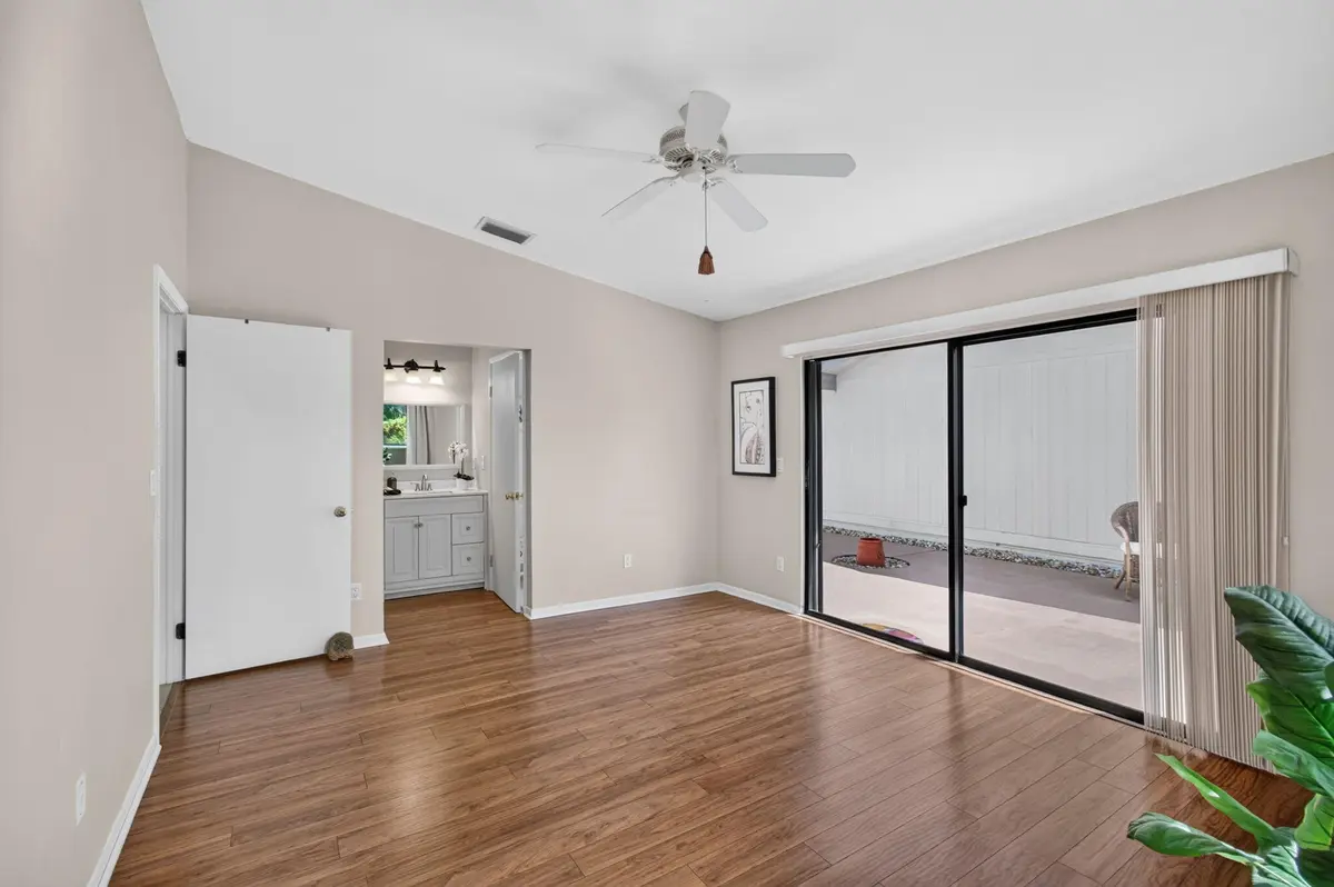 Master Bdrm with view to Patio Oasis at 4 Fawlkland Circle, Boynton Beach