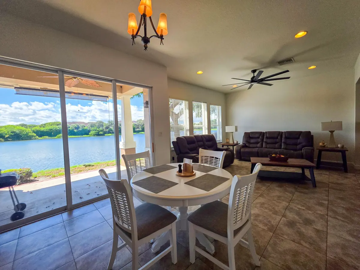 Dining and living area at 855 MARINA DEL RAY Lane 2, West Palm Beach