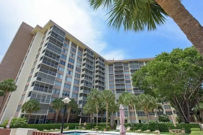 Photo 1 at 10777 W SAMPLE Road 910, Coral Springs