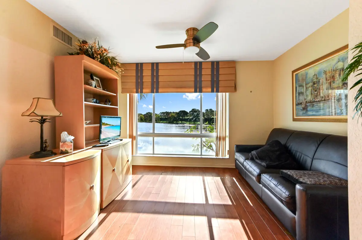 03 - Lake View Living Room at 5842 Crystal Shores Drive 207, Boynton Beach