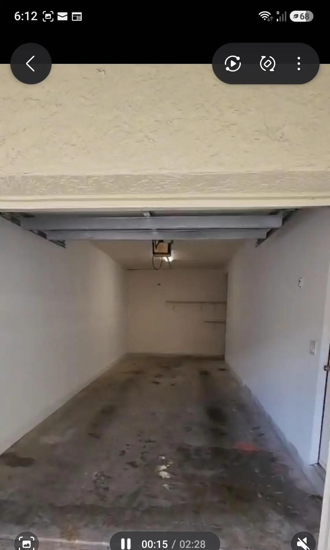 Attached garage at 128 SW PEACOCK Boulevard 15-206, Port St. Lucie