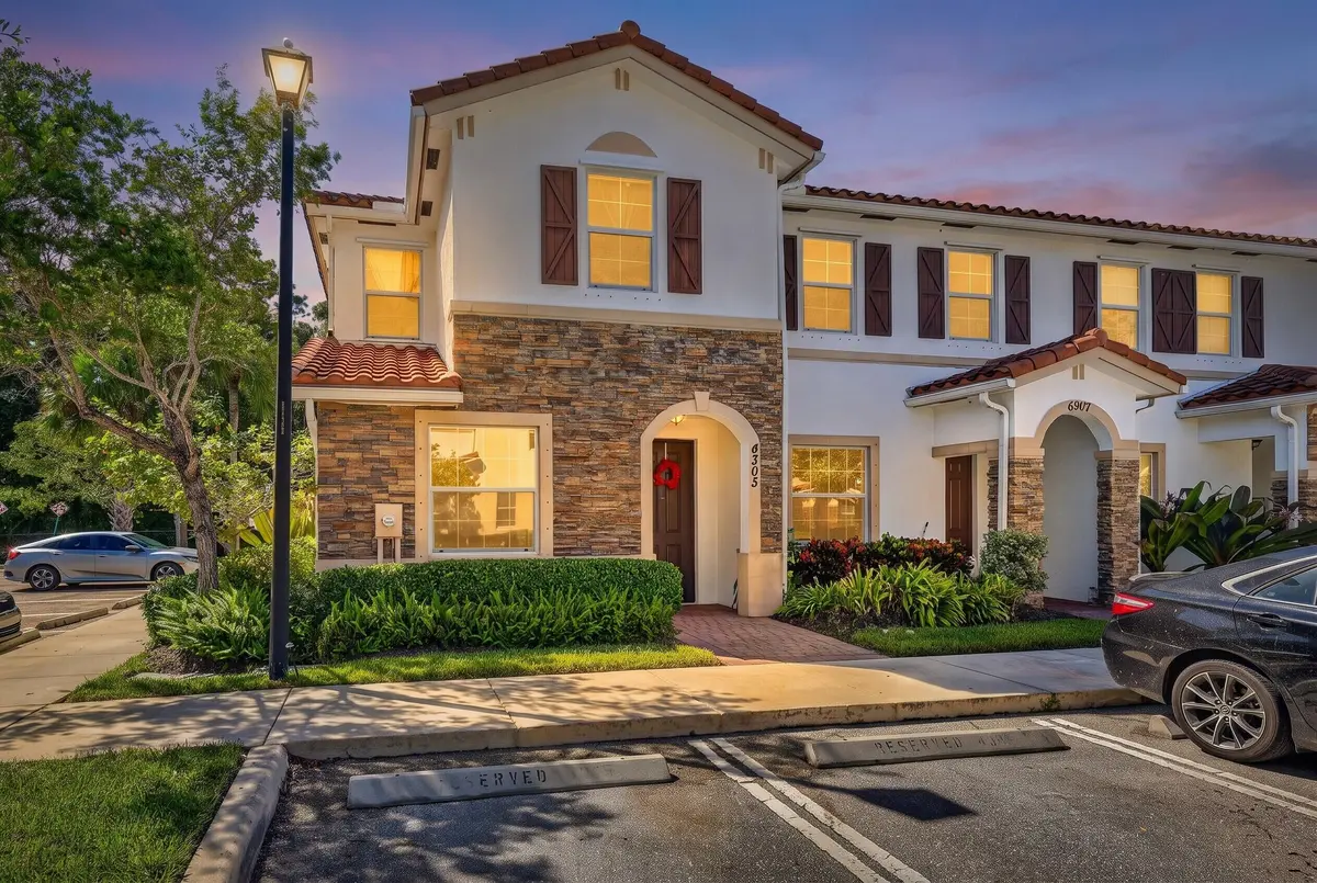 Maybelle-front2-DAY-TO-DUSK-AI (1) at 4305 Maybelle Lane, West Palm Beach
