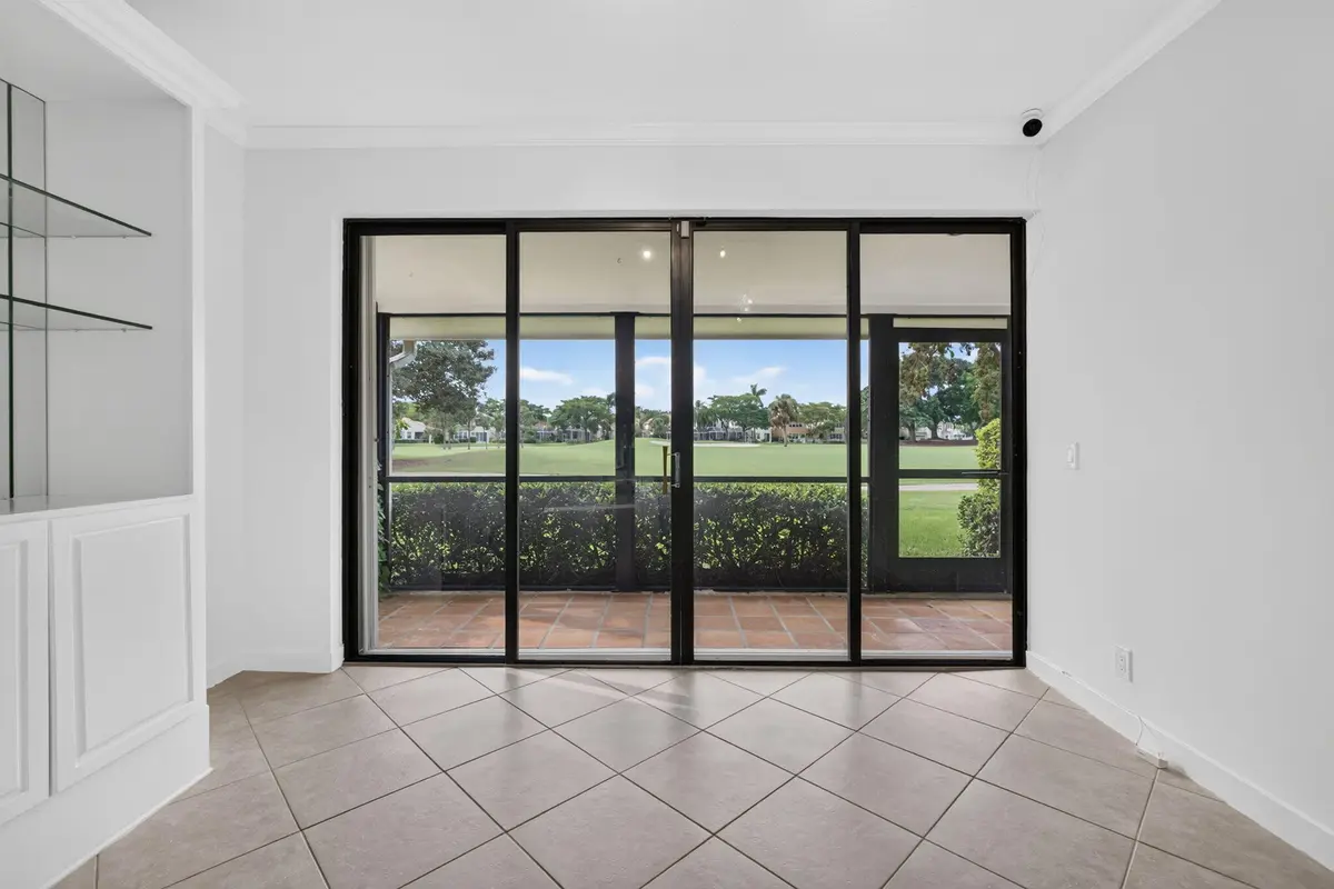 06 - Living area golf view at 287 OLD MEADOW Way, Palm Beach Gardens