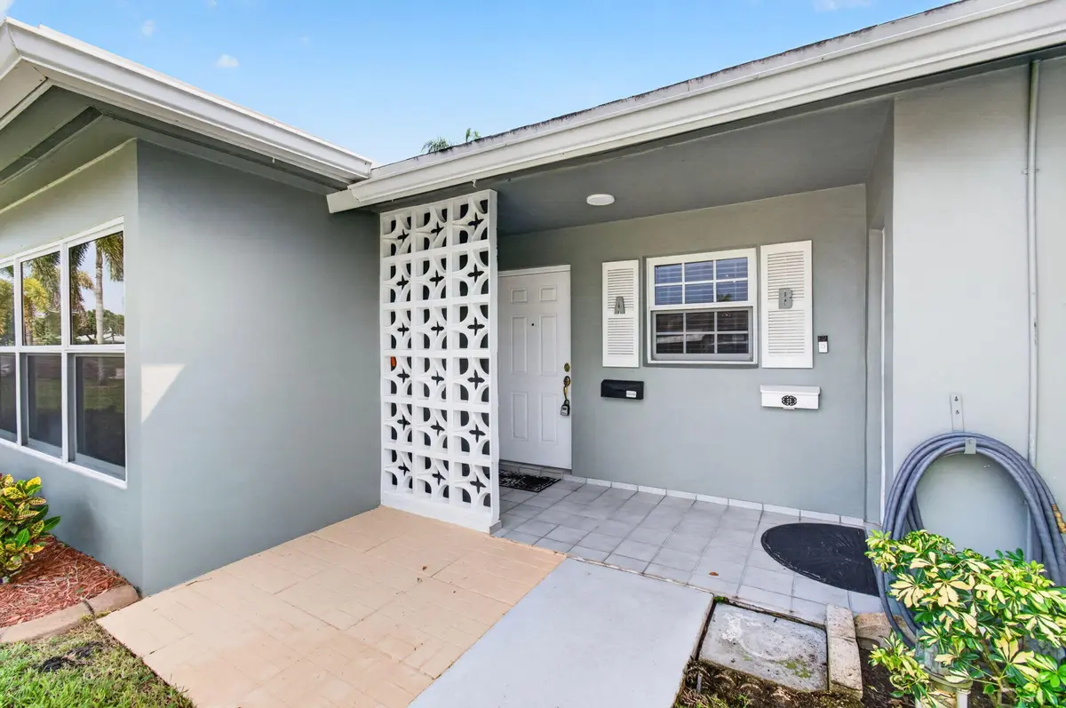 Front entrance to corner villa (1) at 702 South Drive A, Delray Beach