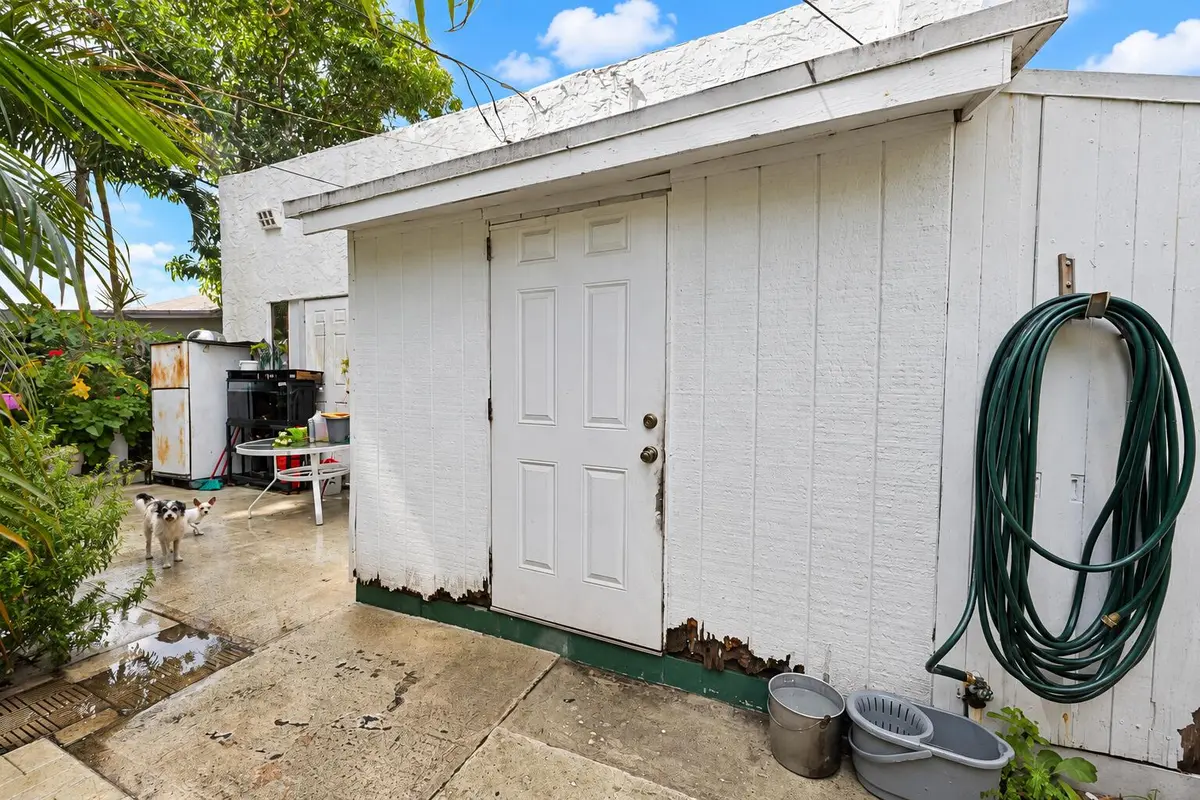 906 utility room door at 906 S J Street, Lake Worth Beach
