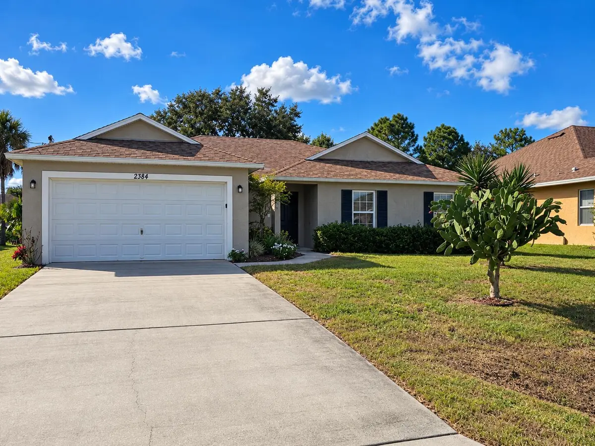 Straightened natural home exterior-2 at 2384 SW Pamona Street, Port St. Lucie