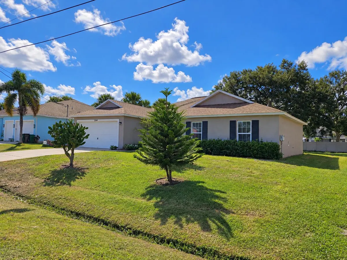 Polished home exterior view-1 at 2384 SW Pamona Street, Port St. Lucie
