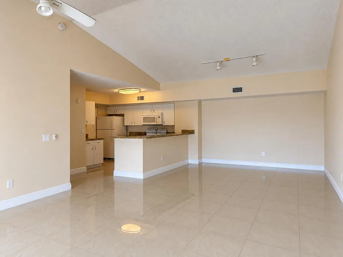 Spacious Neutral Open-Plan Kitchen and L at 2620 S UNIVERSITY Drive 311, Davie