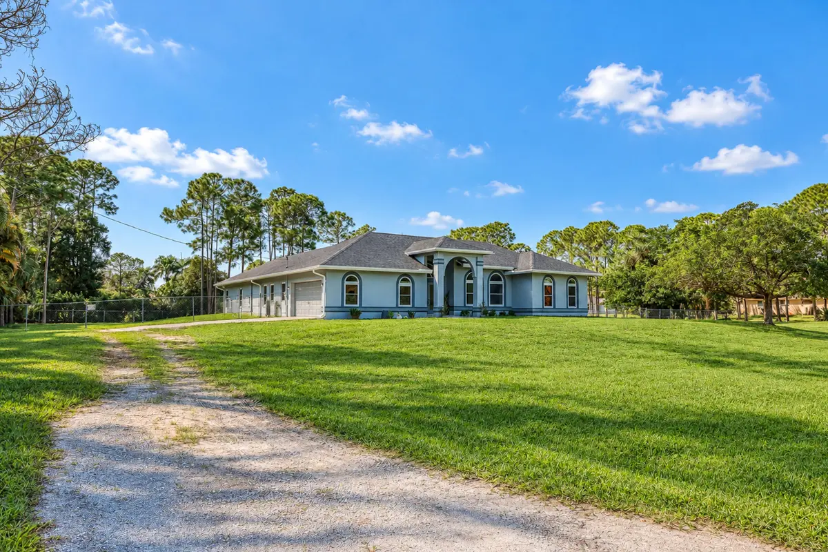 Front of house at 17226 79th Court, The Acreage
