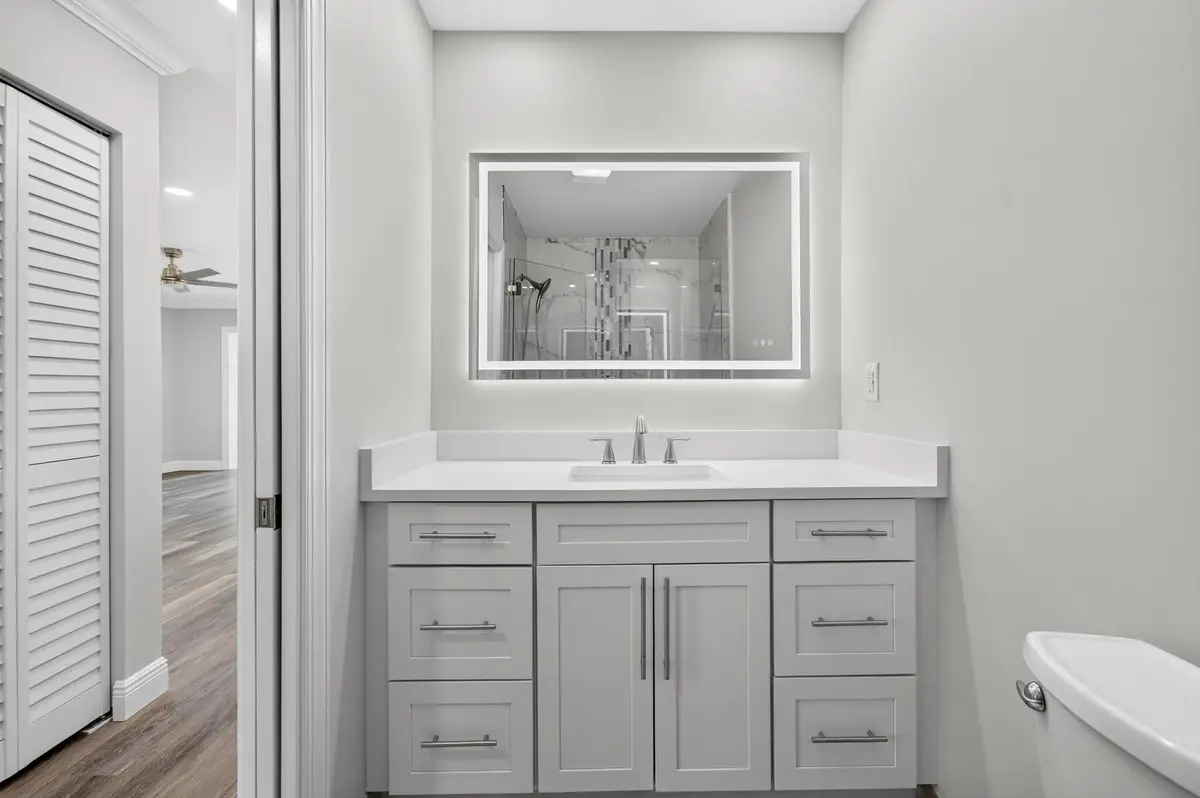 07_Bathroom_1_full_vanity_Original at 455 High Point Boulevard D, Delray Beach