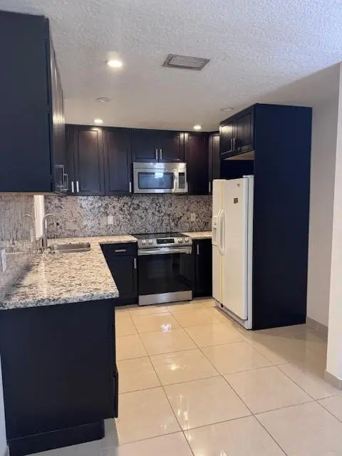 Photo 4 at 2836 Carambola Circle 19107, Coconut Creek