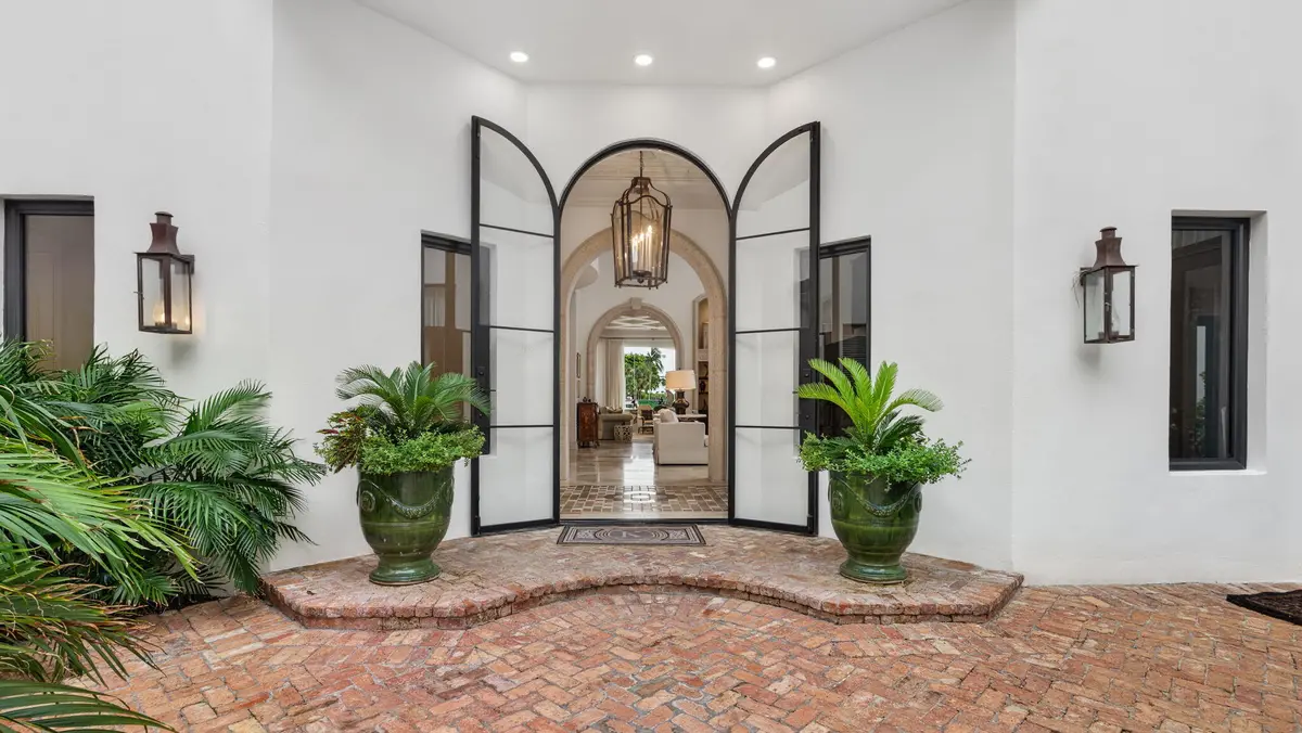 Front Entrance in interior courtyard at 1014 Grand Court, Highland Beach