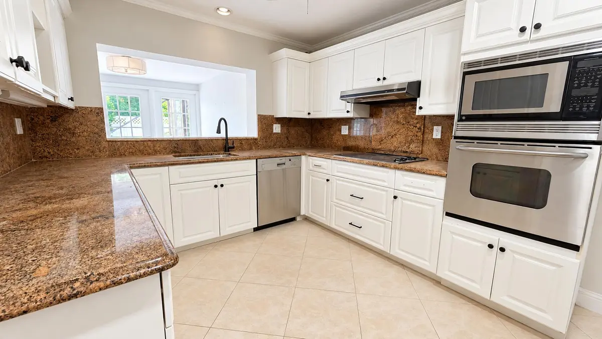 Bright White and Granite Kitchen at 1288 SW 7th Street, Boca Raton