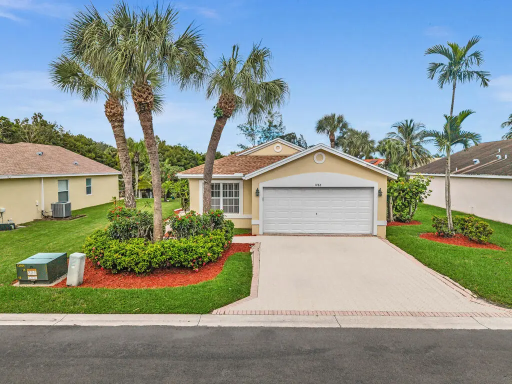 Front of Structure at 1788 SAWGRASS Circle, Greenacres