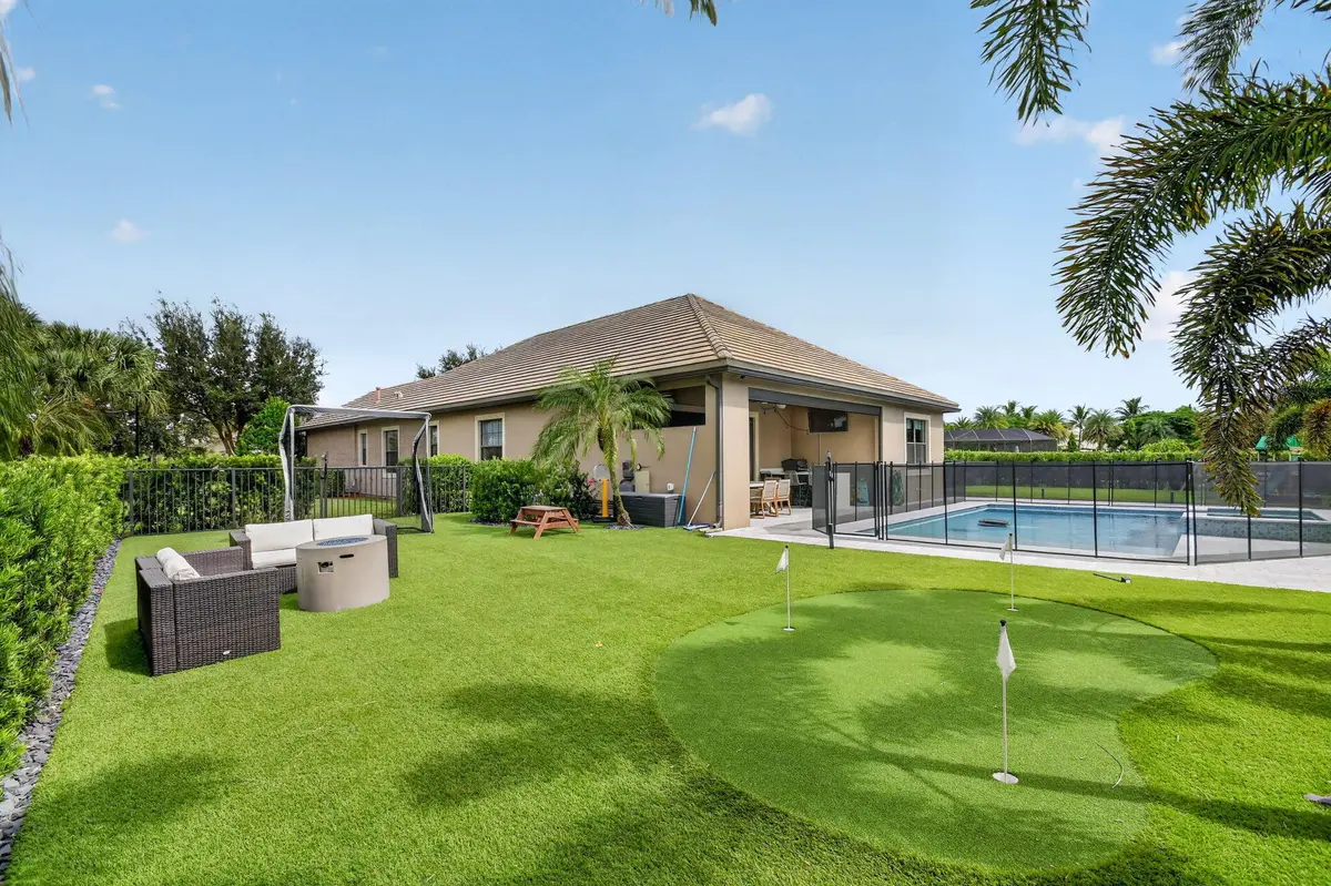Putting Green & Fire Pit at 4637 Siena Circle, Wellington
