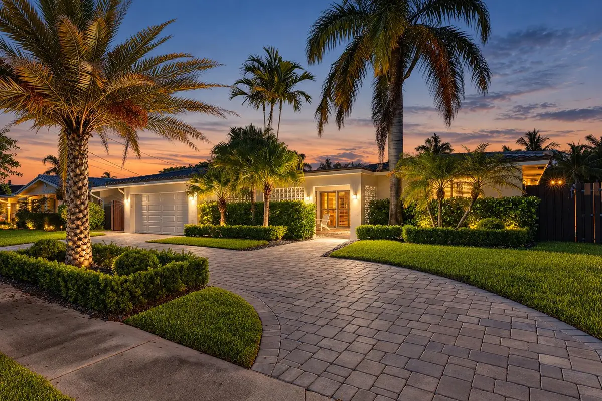 Twilight Tropical Home Exterior at 6520 NE 19th Avenue, Fort Lauderdale