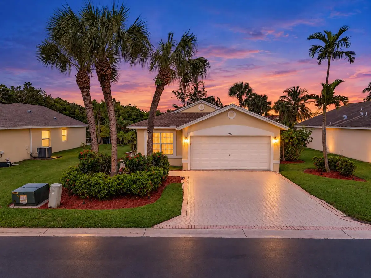 Twilight Photo Front Structure at 1788 SAWGRASS Circle, Greenacres