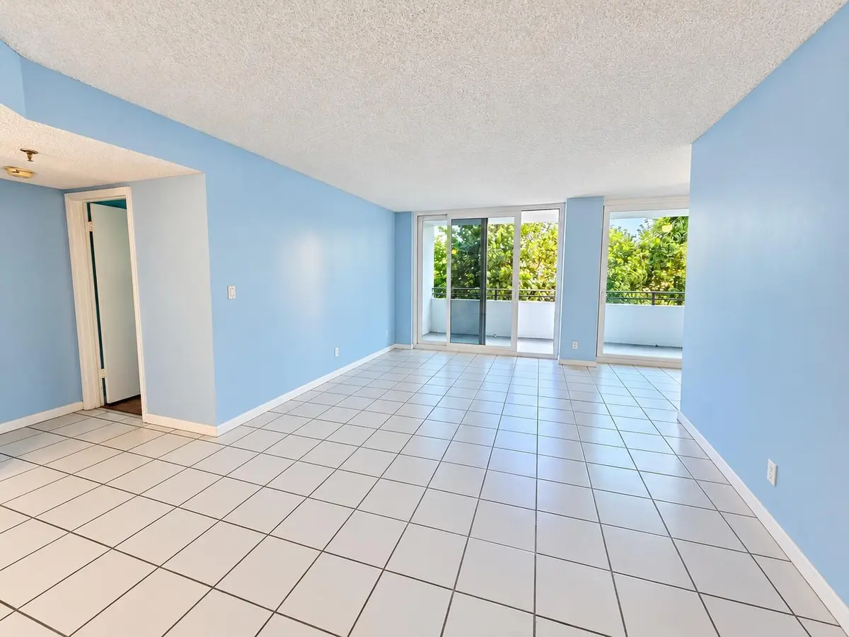 unstaged living room 1 at 1500 N Ocean Boulevard 203, Pompano Beach