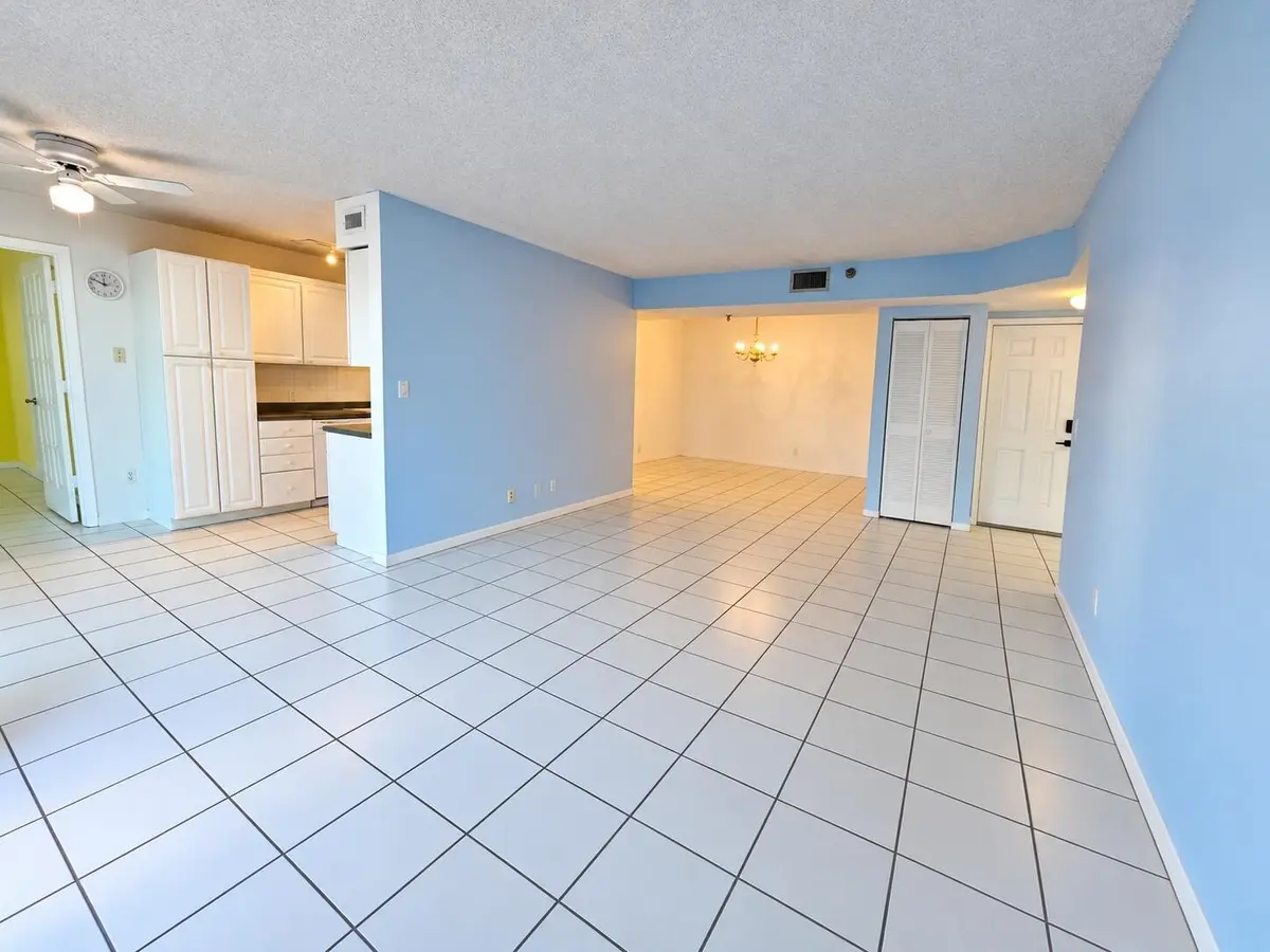 unstaged living room 2 at 1500 N Ocean Boulevard 203, Pompano Beach