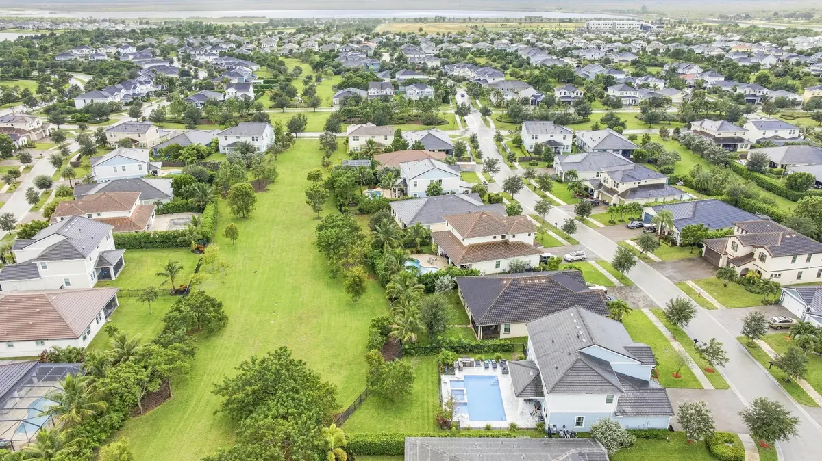 Privacy on your large, fenced lot at 1050 Sweetgrass Street, Loxahatchee
