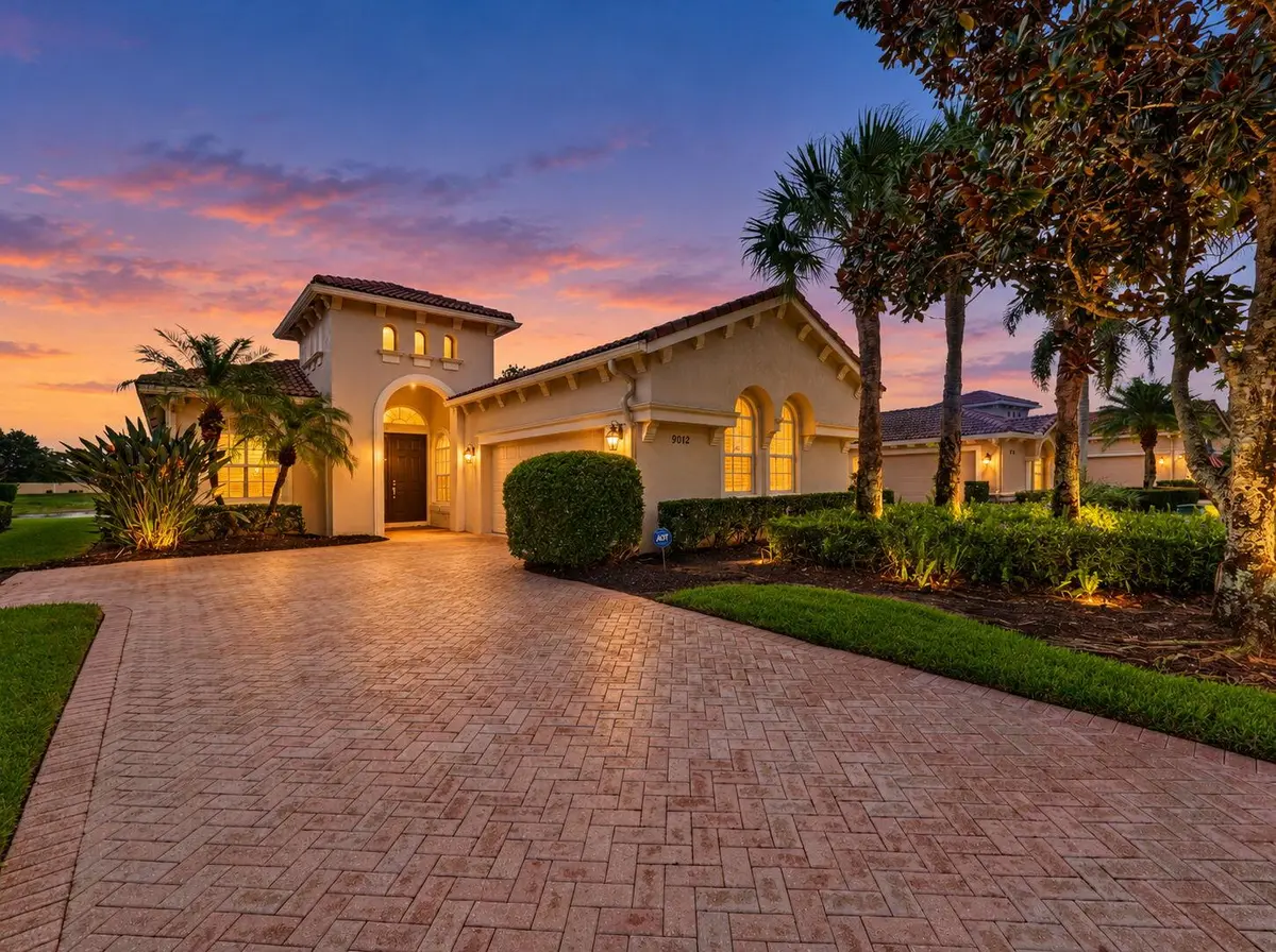 Front - Twilight at 9012 Champions Way, Port St. Lucie