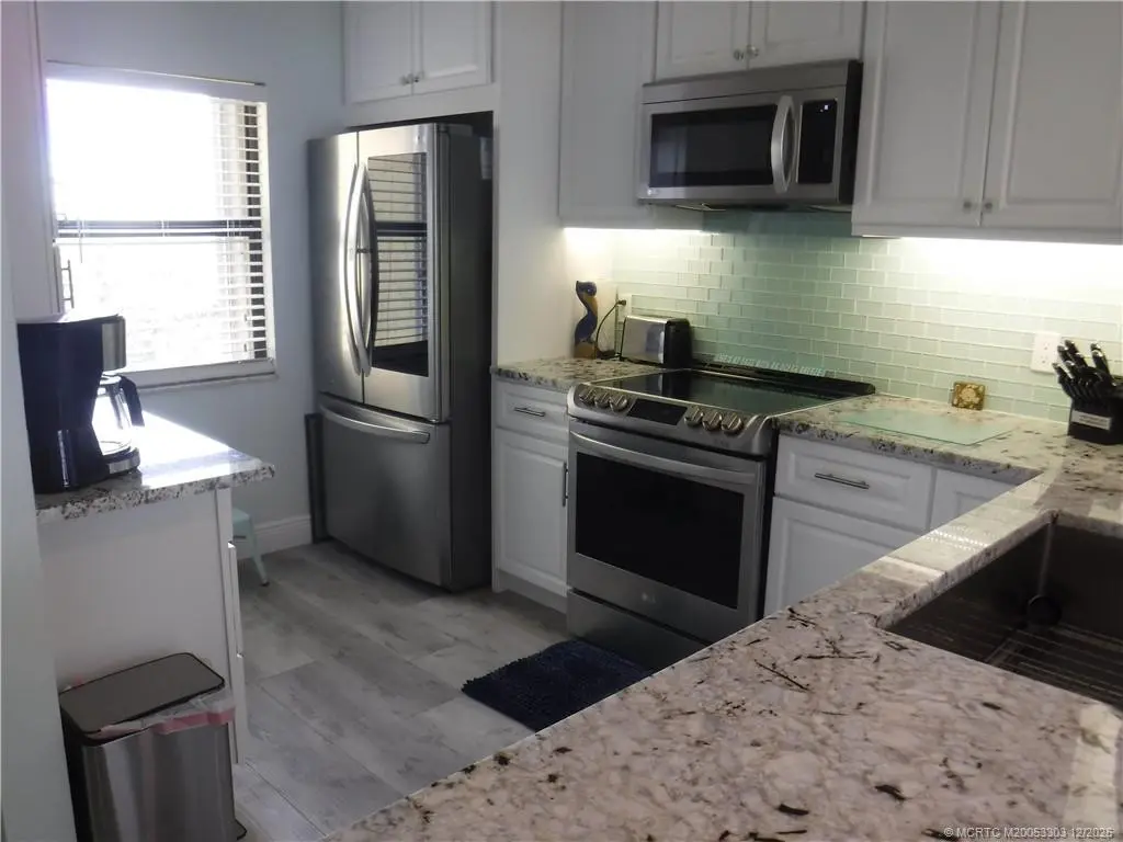 Kitchen with new appliances at 7380 S Ocean Drive 517, Jensen Beach