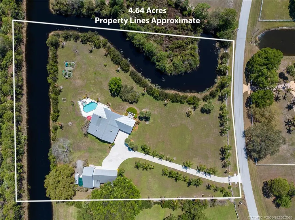 Property lines are approximate at 9812 SW Santa Monica Drive, Palm City