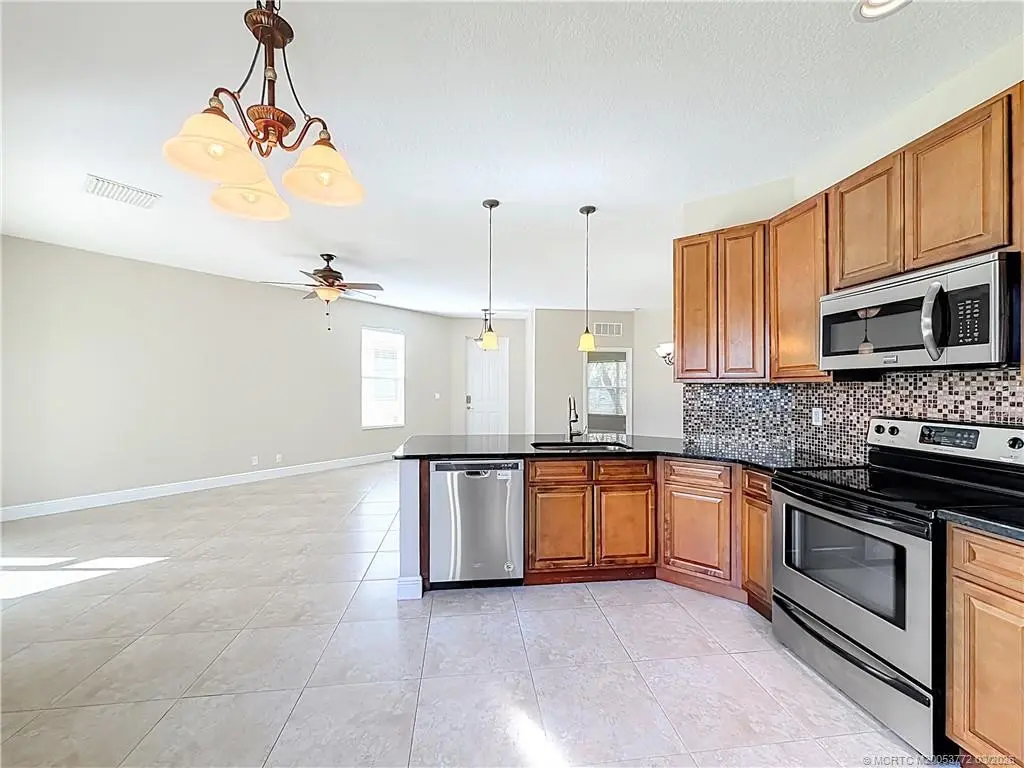 Photo 2 at 211 SW Deleon Springs Drive, Port St. Lucie