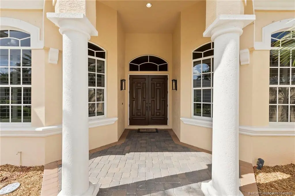 Front porch entry at 511 SW Squire Johns Lane, Palm City