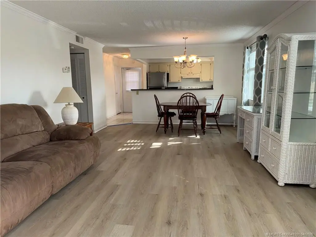 Brand new vinyl flooring and new paint. at 2950 SE Ocean Boulevard 4-4, Stuart