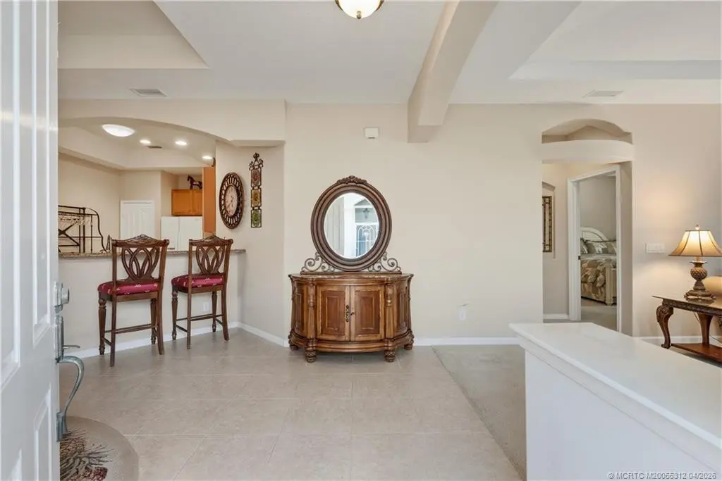 Enter into the Open Floor Plan at 830 NW Red Pine Way, Jensen Beach