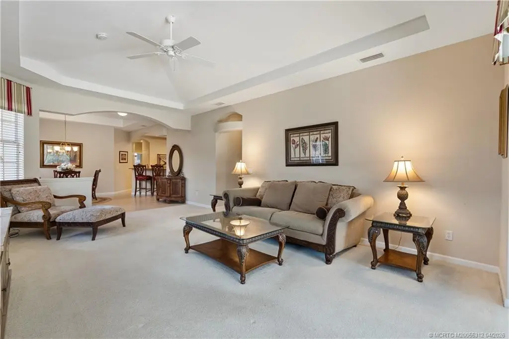 Great Room with Tray Ceiling at 830 NW Red Pine Way, Jensen Beach