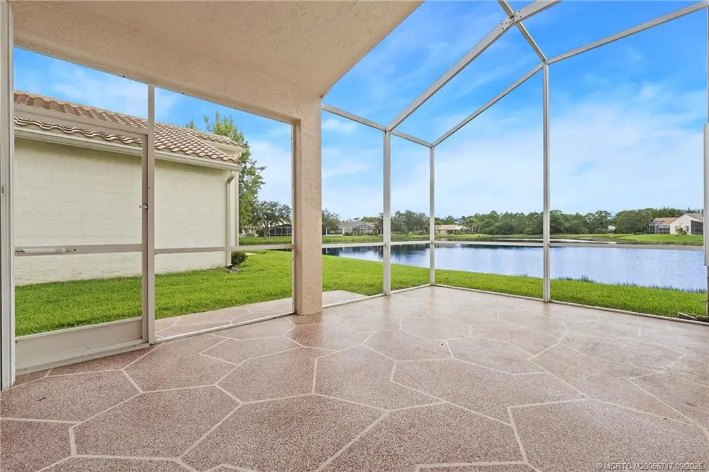Screened lanai overlooking the lake at 313 NW Alana Avenue, Port St. Lucie