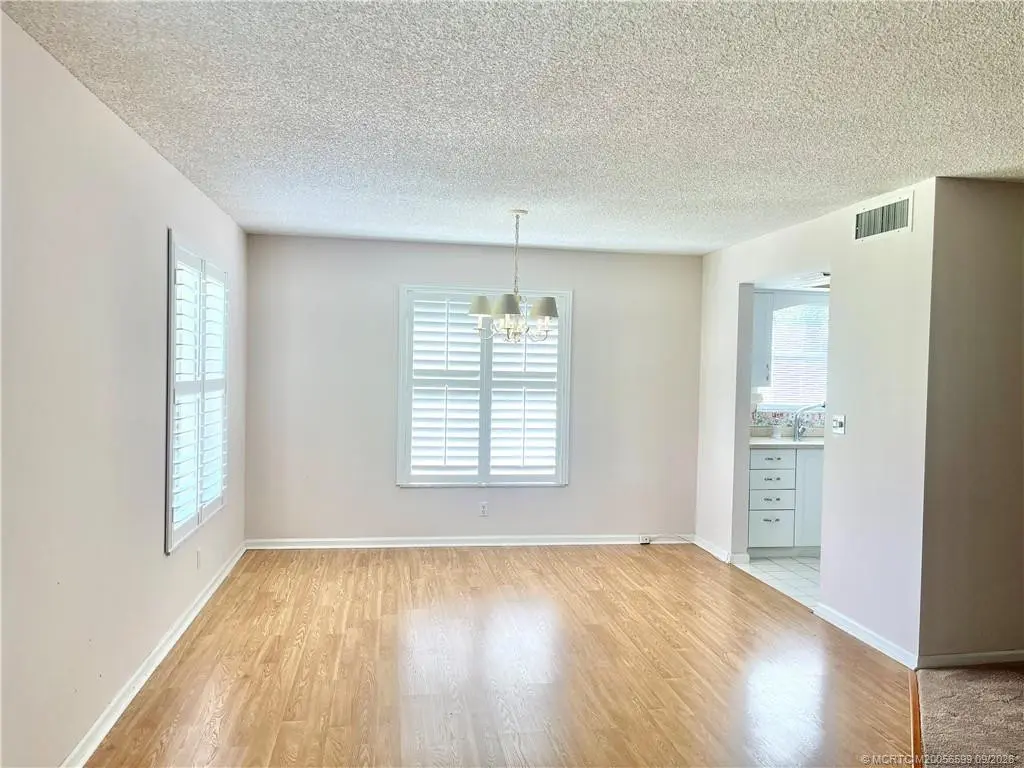Dining area at 911 SW South River Drive 107, Stuart