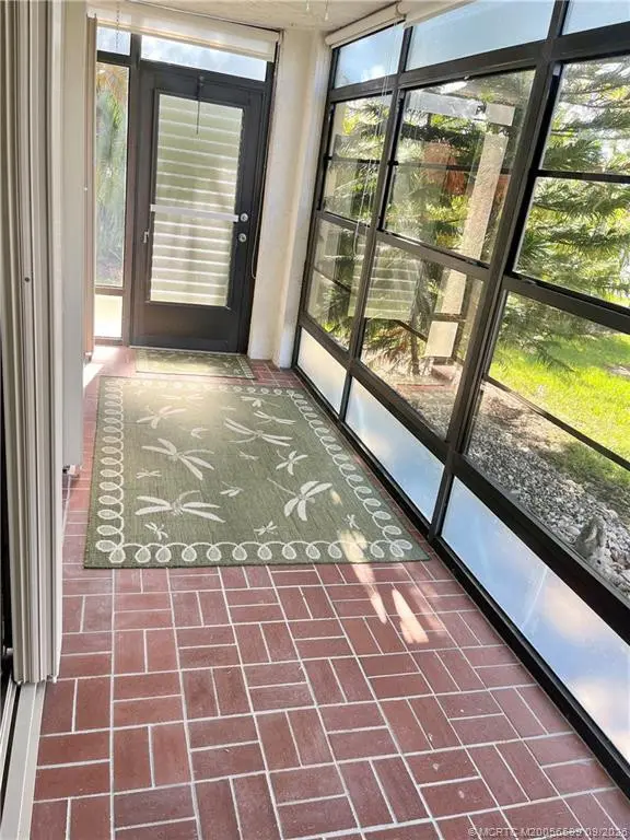 Outdoor patio at 911 SW South River Drive 107, Stuart