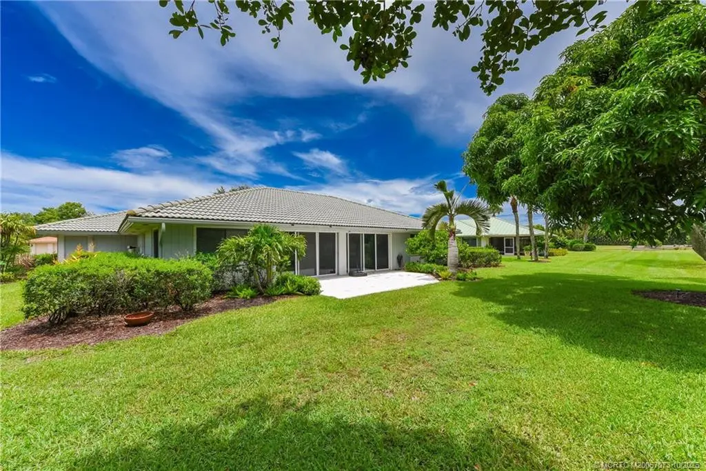 Rear view of 1463 SW Troon Circle at 1463 SW Troon Circle, Palm City