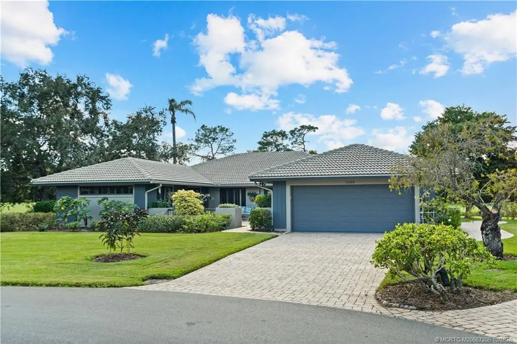 Beautifully landscaped home at 1423 SW Troon Circle, Palm City